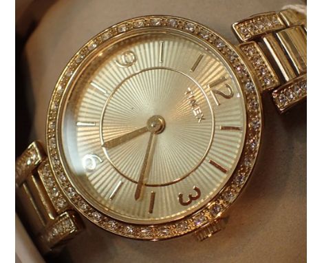New old stock boxed ladies gold tone Timex wristwatch with diamante bezel and matching strap CONDITION REPORT: This item is w