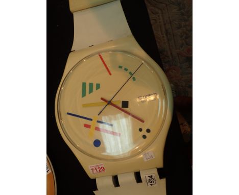 Large Swatch timepiece wall clock (lacking rods which attach watch to strap)