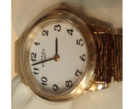 Boxed new old stock ladies gold tone white face Rotary wristwatch with matching strap  CONDITION REPORT: This item is working