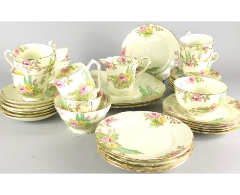 A Radford Fenton Art Deco style tea service, decorated with flowers etc.