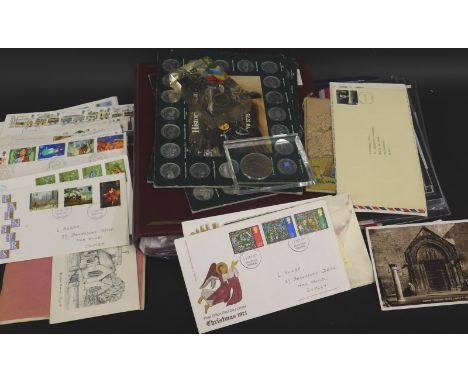 A quantity of First Day covers, postcards, commemorative medallions etc.