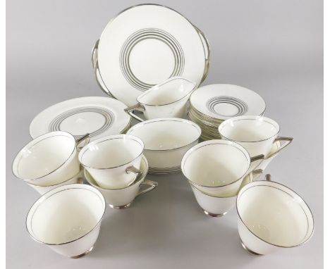 A Royal Doulton Art Deco style part tea set, with angular handles, picked out in silver