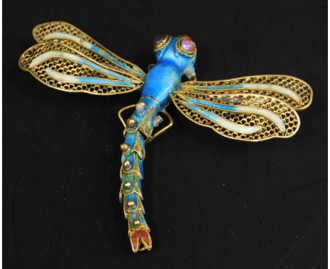 A novelty dragonfly brooch, with enamel design and purple cabochon eyes, white metal stamped 925, 10.8g all in, 6cm long