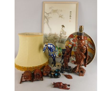 A collection of oriental items, to include a silk work picture, carved hardwood table lamp, a Tang style horse, etc.