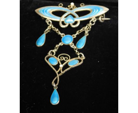 A silver and enamel Norwegian drop brooch, set with blue enamel in the Art Nouveau style, marks to back Marius Hammer of Norw