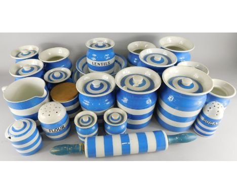 A large collection of T & G Green Cornishware, to include a flour shaker, storage jars and covers, rolling pin etc., some pie