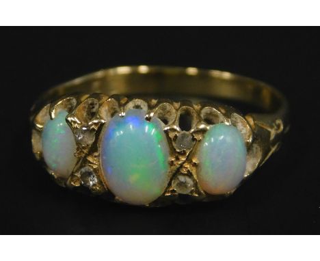 A modern opal style dress ring, gold plated