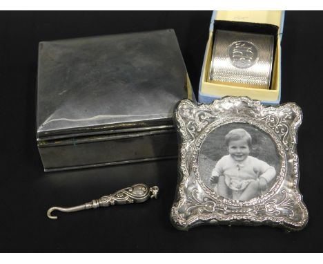 Miscellaneous items of small silver, to include a square cigarette box, large napkin ring in fitted case etc.