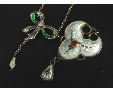 Two items of silver and enamel jewellery, to include a pendant with floral drop and a silver plated bow necklace, with green 