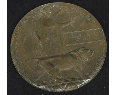 A First World War death plaque or penny, awarded to a George Richard Cooper