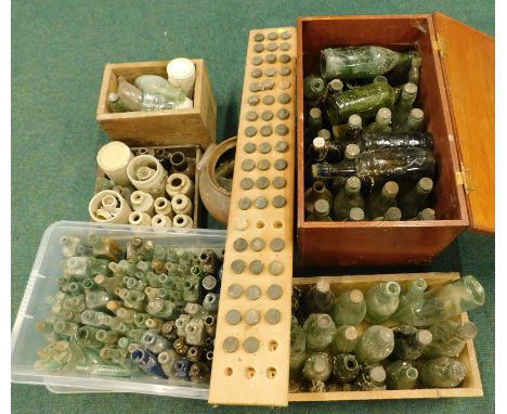 A quantity of excavated old bottles, a green painted wooden trunk etc