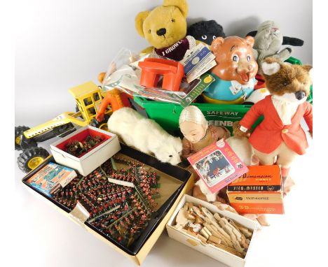 A collection of toys, to include model soldiers, a plastic Rupert the Bear toy etc.