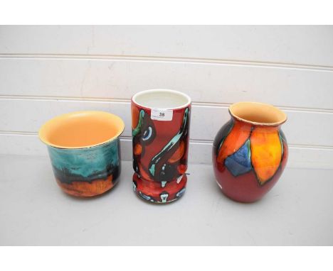 TWO MODERN POOLE POTTERY VASES TOGETHER WITH A SIMILAR JARDINIERE