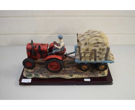 MODERN RESIN ORNAMENT OF A VINTAGE TRACTOR AND TRAILER