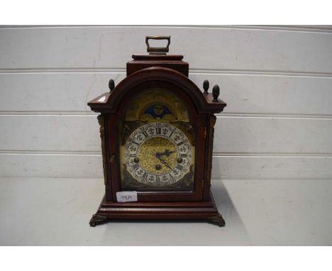 MODERN GERMAN MAHOGANY CASED MANTEL CLOCK WITH THREE TRAIN MOVEMENT AND MOON PHASE FEATURE