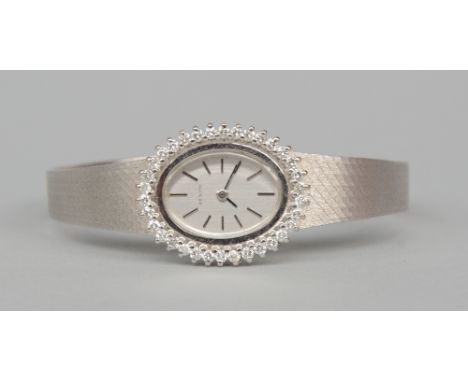 A Zenith ladies wristwatch, gold 18ct, set with 35 brilliant cut diamonds, Total weight: 33,1 g (the movement included)