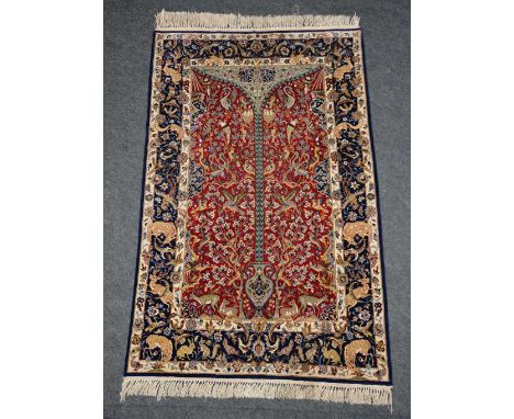 An Oriental carpet depicting the Tree of Life, wool and cotton, 112 x 180 cm 