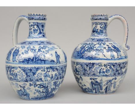 Two blue and white jugs in Dutch Delftware, chinoiserie decorated, marked, H 35 cm