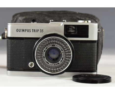 Olympus Trip 35 film camera, serial number 4808736, with lens cap and soft case