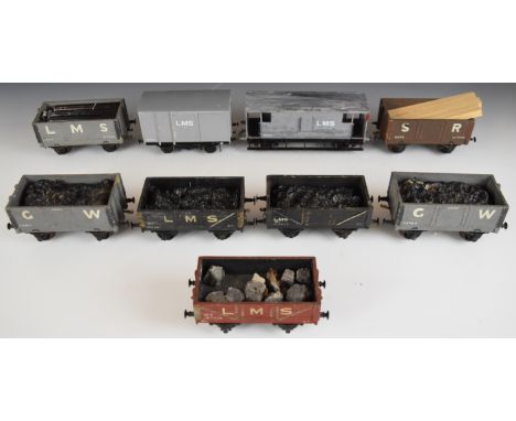 Nine 0 gauge model railway goods wagons to include Great Western, LMS and Southern.