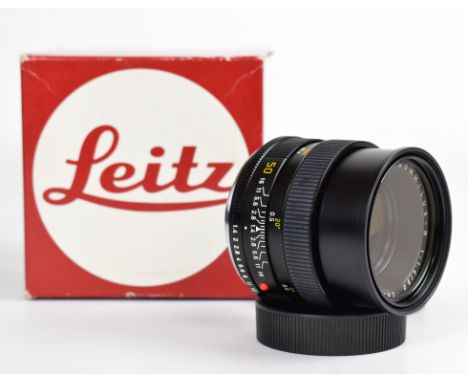Leitz Summilux-R R mount 1:1.4/50mm lens, serial number 3170520, circa 1982, with 13373 filter and lens caps, in original box