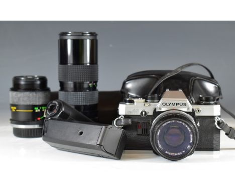 Olympus OM10 35mm SLR camera with 50mm 1:1.8 lens, Vivitar 28-70mm 1:3.5-4.8 and Tefnon 70-162mm 1:3.5 lenses and Olympus win