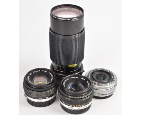 Four Olympus 35mm SLR and digital camera lenses comprising M.Zuiko digital 14-42mm 1:3.5-5.6, Vivitar 80-200mm 1:4 and two Ol