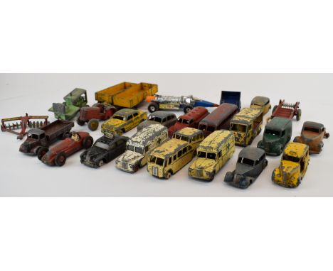 Seventeen vintage Dinky cars, vans and buses to include Trojan, Ford Sedan, Alfa-Romeo, Observation Coach, Daimler, Vanguard 