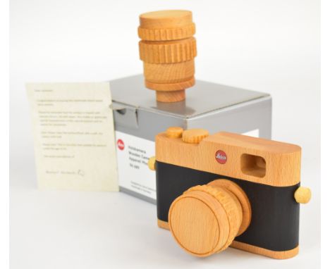 Leica promotional or retail display novelty wooden camera, 96689, in original box with extra lens, length of camera body 13.5