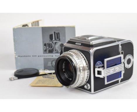 Hasselblad 1000F medium format camera, serial number CC13035, circa 1955, with Carl Zeiss Tessar 1:2.8 f=80mm lens, serial nu