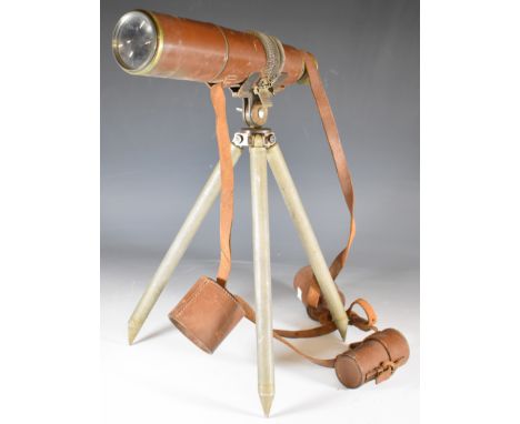 Dolland London leather bound brass three draw telescope, attached to a Parker Hale tripod