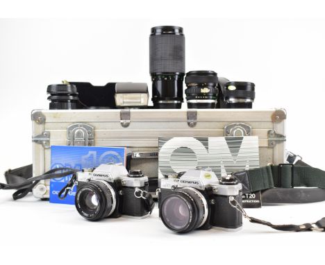 Olympus OM-10 twin 35mm SLR camera outfit, with two Zukio Auto-S 1:1.8 f=50mm and one 28-48mm 1:4 lenses, Vivitar 70-210mm 1: