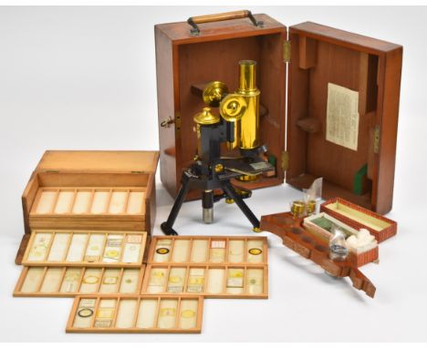 J.Swift &amp; Son 19th or early 20th century brass microscope, in fitted wooden case with extra lenses, together with a box o