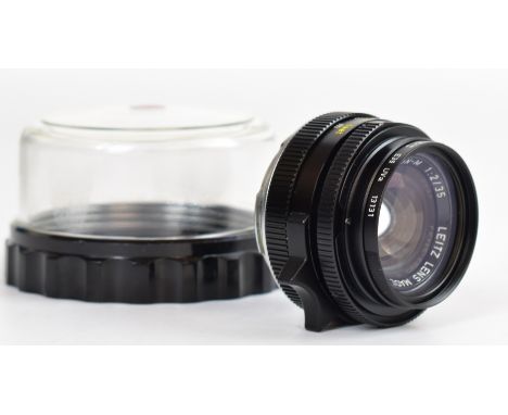 Leitz Canada Summicron-M M mount 1:1.2/35 camera lens, serial number 3183155, circa 1982, with Leitz UVa filter, in Leitz bub