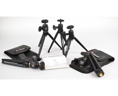 Five Manfrotto table top camera tripods comprising three 482 and two 709B Digi, two in original pouches