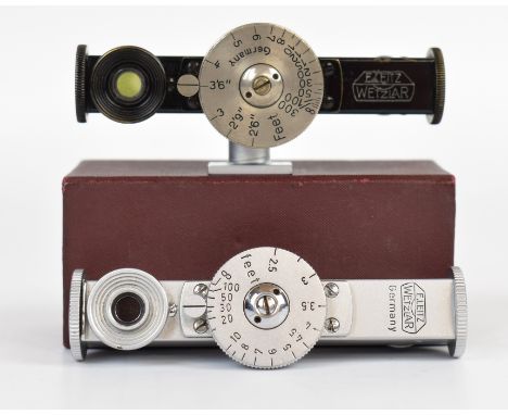 Two Leitz short base rangefinders, one chrome in original box, the other black with shoe, to suit Leica or similar cameras