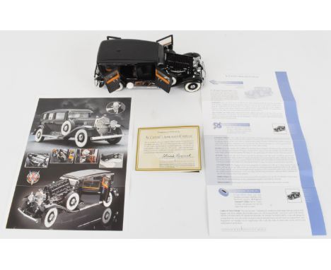 Franklin Mint 1:24 scale Al Capone's Armoured Cadillac diecast model car, in original box with certificate.