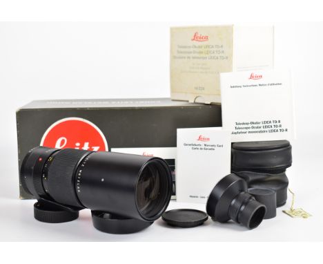 Leitz Telyt-R R mount 1:4/250mm lens, serial number 3076013, circa 1980, with front and rear covers and telescope ocular to L