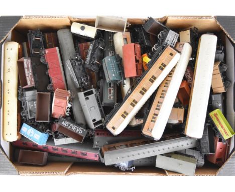 Over sixty Hornby, Mainline and similar 00 gauge model railway carriages and goods wagons.