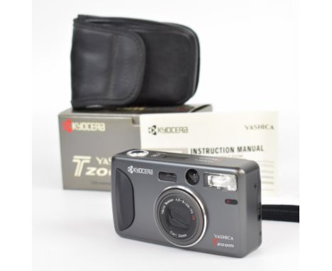 Kyocera Yashica T zoom 35mm camera, serial number 006352, with Carl Zeiss Vario Tessar 4.5-8/28-70 T* lens, soft case, instru