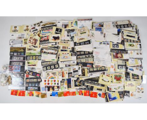 GB mint stamp collection in booklets and presentation packs along with first day covers, high face value