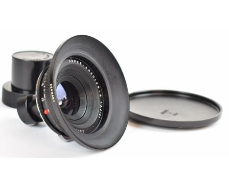 Leitz super-angulon-R R mount 1:3.4/21mm camera lens, serial number 2056686, circa 1964, with 14170W hood and front and rear 