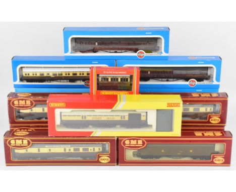 Fifteen Airfix and Hornby 00 gauge model railway passenger carriages and goods wagons to include GWR and LMS examples, all in