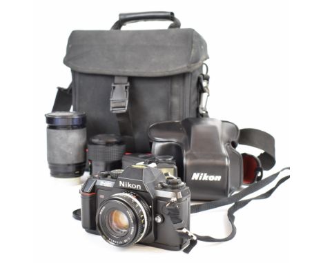 Nikon F-301 35mm SLR camera outfit, with Nikkor 50mm 1:1.8, Vivitar 28-200mm 1:3.5-5.3 and Sirius MC 1:3.5-4.5 f=28-70mm lens