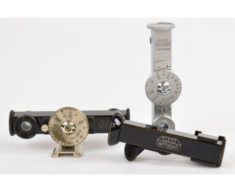 Two Leitz short base rangefinders, one chrome, the other black on mounting shoe and a WINTU right angle viewer