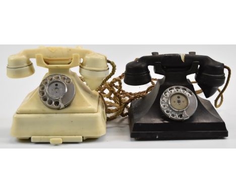 Two vintage Bakelite telephones comprising black Siemens example and white model 1/232CB