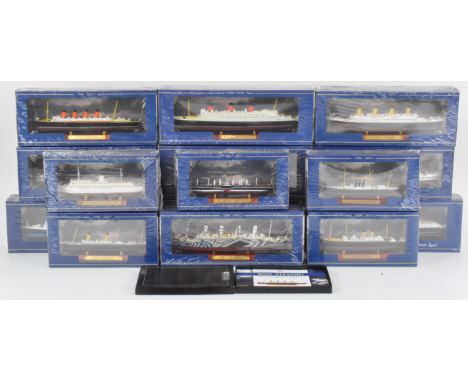 Fifteen Atlas Editions model ocean liners, all in sealed original boxes with certificates of authenticity.