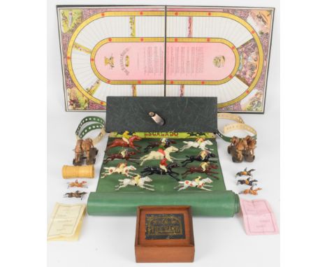 The Game Of The Race steeplechase game with five painted metal horses, shaker and instructions, housed in compartmented woode