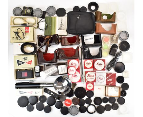 Leica and Leitz camera accessories to include flash on rangefinder camera base, filters, caps, belt, ELDIA contact printer, e