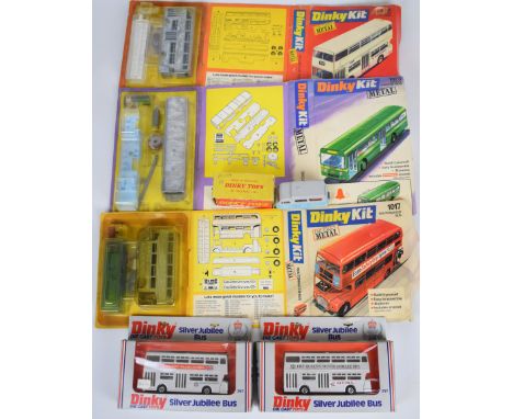 Six vintage Dinky Toys diecast model buses comprising DinkyKits 1017, 1018, 1023. two Silver Jubilee Bus 297 and Atlas Bus 29